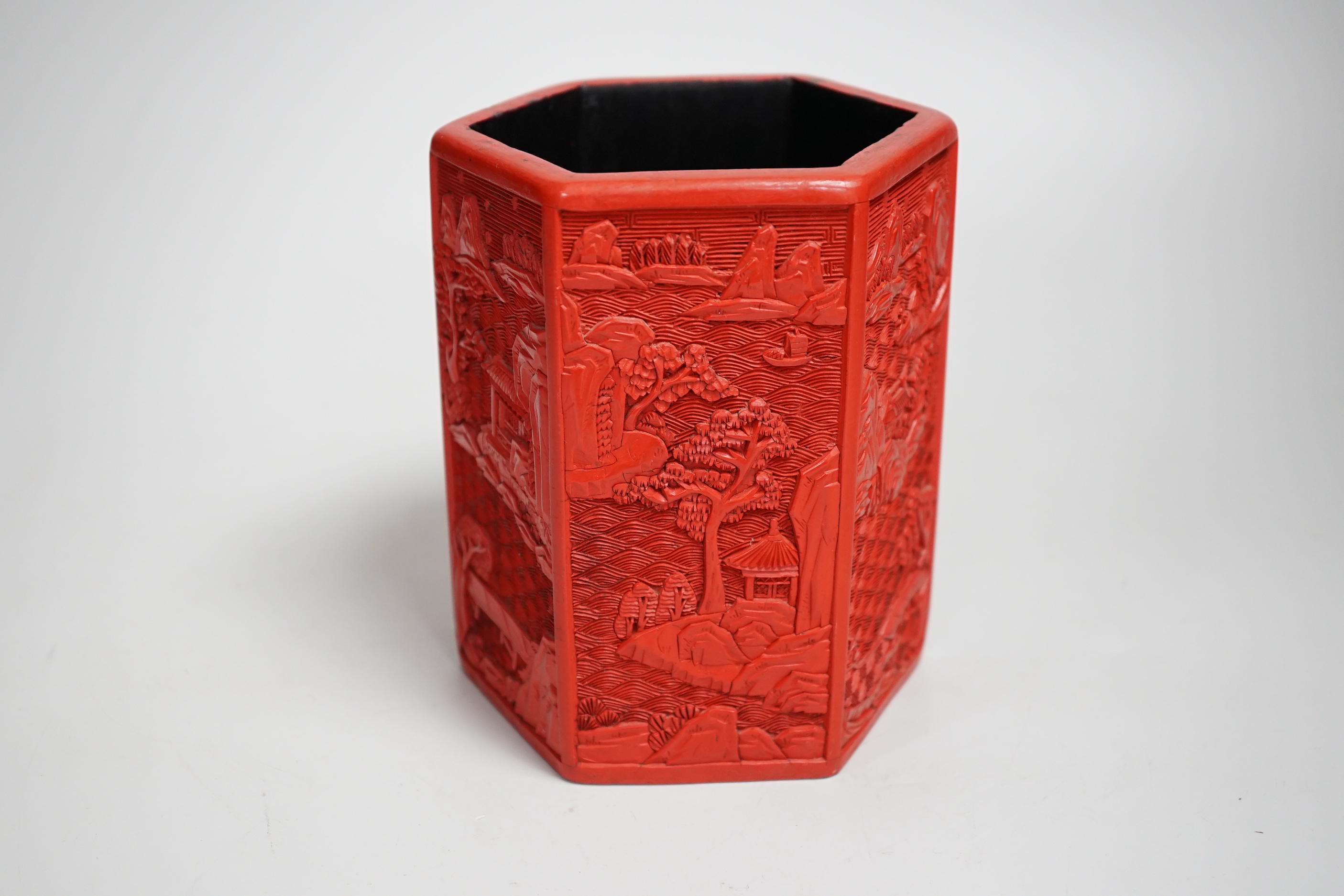 A Chinese cinnabar lacquer hexagonal brushpot, 14.5cm high